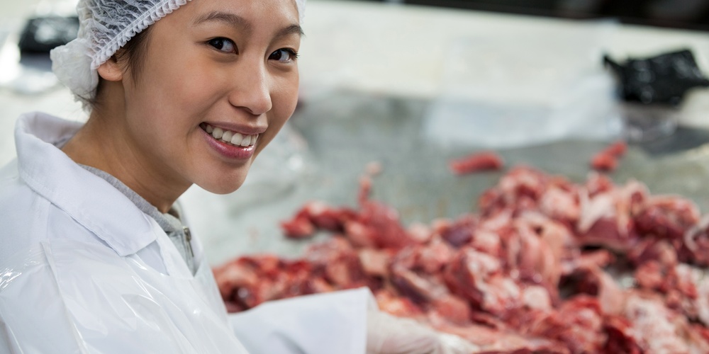Adobe Stock 132232808 Asian Female Meat Worker